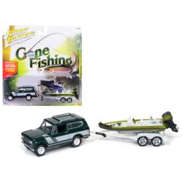 1979 International Scout Emerald green Poly with Bass Boat \Gone Fishing\ 1/64 Diecast Model Car by Johnny Lightning